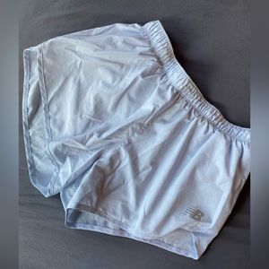 New Balance light grey blue shorts